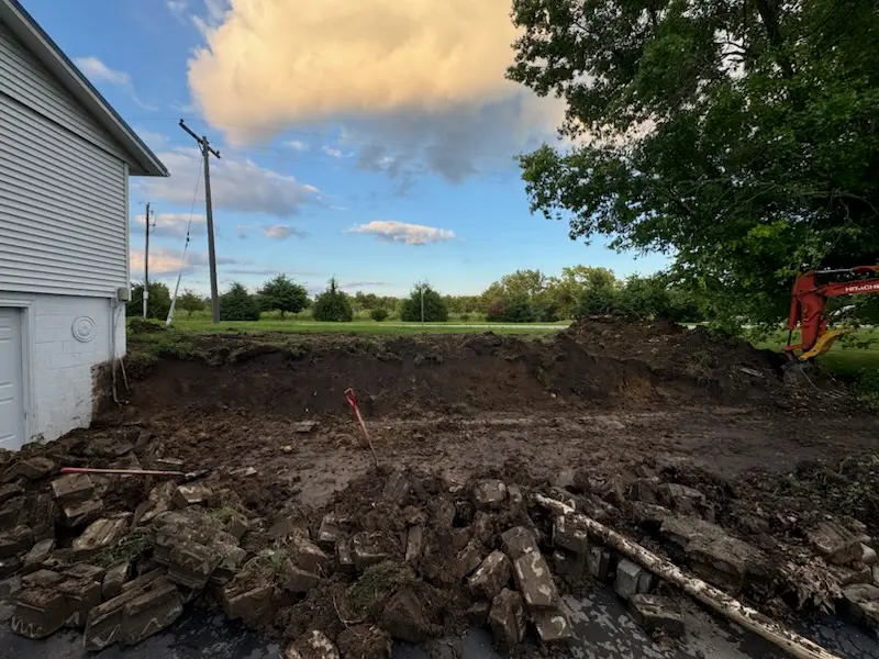 Residential excavation and dirt work beside a home in central Illinois by Foil Land Services