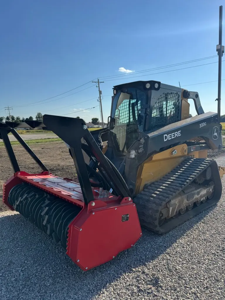 John Deere 333G compact track loader with a forestry mulching head by Foil Land Services